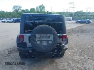 2014 Jeep Wrangler Unlimited Sport with VIN 1C4BJWDG6EL194359, listed as a IAAI auction lot 42182236 with 134,889 mi miles and . Bid and sale history available at DreamBid. Image 16.