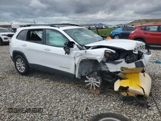 2022 Jeep Cherokee Latitude Lux with VIN 1C4PJMMX8ND554154, listed as a Copart auction lot 56482135 with 55,417 mi miles and Salvage title. Bid and sale history available at DreamBid. Image 4.