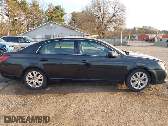 2010 Toyota Avalon XL with VIN 4T1BK3DB0AU355952, listed as a IAAI auction lot 41834083 with 177,098 mi miles and . Bid and sale history available at DreamBid. Image 13.