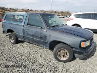 1994 Mazda B-Series Truck z VIN 4F4CR12AXRTM29986, wystawiony jako Copart lot #78825554 z przebiegiem 183 595 mil mil oraz Szkoda całkowita • Salvage title. Historia ofert i sprzedaży dostępna na DreamBid. Obrazek 4.