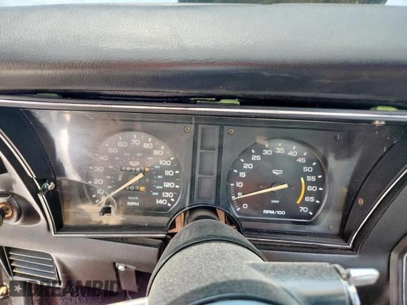 1979 Chevrolet Corvette with VIN 1Z8749S407485, listed as a Copart auction lot 63649885 with 83,814 mi miles and Salvage title. Bid and sale history available at DreamBid. Image 9.