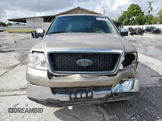 2004 Ford F-150 XLT with VIN 1FTRW12W94KC10443, listed as a Copart auction lot 63380525 with 206,815 mi miles and Salvage title. Bid and sale history available at DreamBid. Image 5.