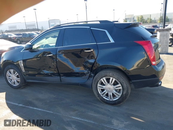2015 Cadillac SRX z VIN 3GYFNAE32FS543933, wystawiony jako IAAI lot #41578338 z przebiegiem 150 937 mil mil oraz . Historia ofert i sprzedaży dostępna na DreamBid. Obrazek 14.