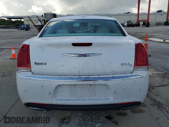 2015 Chrysler 300 C with VIN 2C3CCAET3FH830414, listed as a Copart auction lot 73649014 with Not Provided miles and Salvage Title. Bid and sale history available at DreamBid. Image 6.