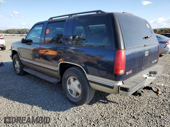 1998 GMC Yukon with VIN 1GKEK13R6WJ706204, listed as a Copart auction lot 77577074 with 186,023 mi miles and Salvage Title. Bid and sale history available at carsss.com. Image 2.
