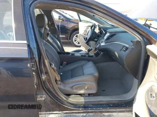 2014 Chevrolet Impala LT with VIN 2G1125S3XE9315199, listed as a IAAI auction lot 41824899 with 235,368 mi miles and . Bid and sale history available at DreamBid. Image 5.