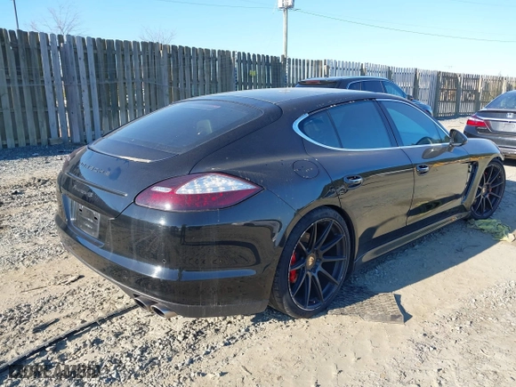 2010 Porsche Panamera S with VIN WP0AB2A71AL063114, listed as a IAAI auction lot 41169138 with 127,292 mi miles. Bid and sale history available at carsss.com. Image 4.