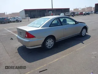 2005 Honda Civic Cpe LX with VIN 1HGEM22575L060752, listed as a IAAI auction lot 41688529 with 69,542 mi miles. Bid and sale history available at carsss.com. Image 4.