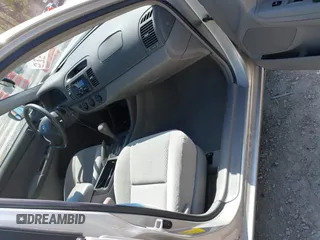 2004 Toyota Camry LE with VIN 4T1BE30K14U290983, listed as a IAAI auction lot 41983078 with 174,852 mi miles and . Bid and sale history available at carsss.com. Image 5.