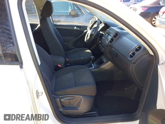2012 Volkswagen Tiguan SE with VIN WVGAV7AX9CW590965, listed as a IAAI auction lot 41852407 with 153,953 mi miles and . Bid and sale history available at DreamBid. Image 8.