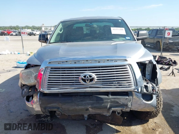 2011 Toyota Tundra with VIN 5TFRM5F18BX033833, listed as a IAAI auction lot 42257200 with 108,046 mi miles and . Bid and sale history available at DreamBid. Image 6.