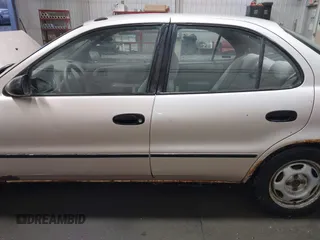 1997 Geo Prizm z VIN 1Y1SK526XVZ406366, wystawiony jako IAAI lot #41409191 z przebiegiem 259 489 mil mil oraz . Historia ofert i sprzedaży dostępna na DreamBid. Obrazek 14.