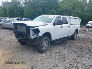 2024 Ram 2500 Tradesman with VIN 3C6UR5HJ8RG288173, listed as a IAAI auction lot 42290610 with 5,757 mi miles and . Bid and sale history available at DreamBid. Image 2.