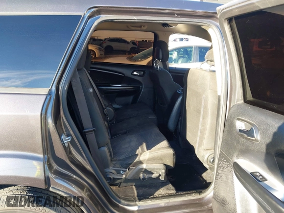 2019 Dodge Journey SE with VIN 3C4PDCBG7KT872888, listed as a IAAI auction lot 41390094 with 114,513 mi miles and . Bid and sale history available at DreamBid. Image 8.