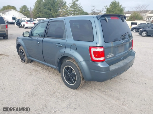 2011 Ford Escape XLT with VIN 1FMCU9DG9BKC38929, listed as a IAAI auction lot 41784854 with 216,201 mi miles. Bid and sale history available at carsss.com. Image 3.