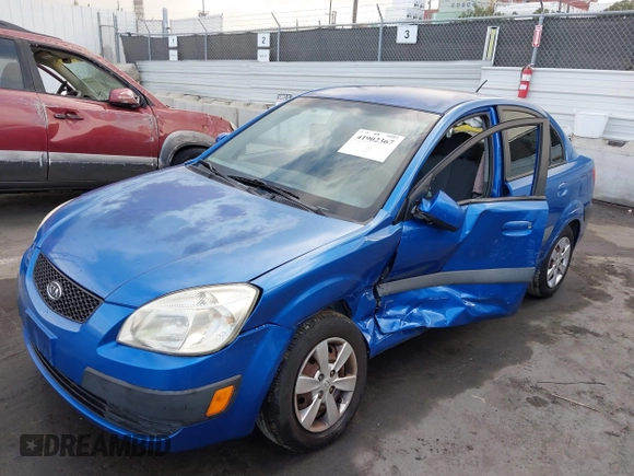 2008 Kia Rio LX with VIN KNADE123486365738, listed as a IAAI auction lot 41902367 with 248,194 mi miles. Bid and sale history available at carsss.com. Image 2.