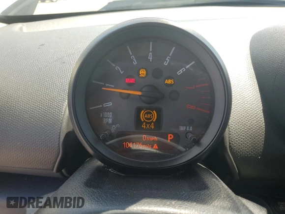 2016 MINI Countryman S with VIN WMWZC5C51GWU00690, listed as a Copart auction lot 55077095 with 104,176 mi miles and Salvage title. Bid and sale history available at DreamBid. Image 9.