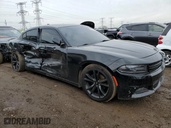 2017 Dodge Charger SXT with VIN 2C3CDXHG6HH606426, listed as a Copart auction lot 52100185 with 122,910 mi miles and Salvage Title. Bid and sale history available at DreamBid. Image 4.