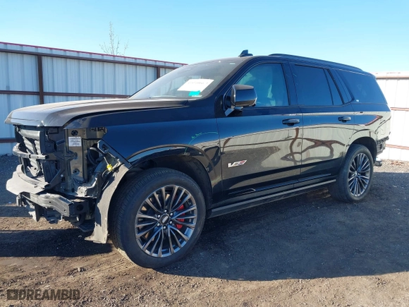 2023 Cadillac Escalade AWD V-Series with VIN 1GYS4HK97PR453426, listed as a IAAI auction lot 41411066 with 13,764 mi miles. Bid and sale history available at carsss.com. Image 2.