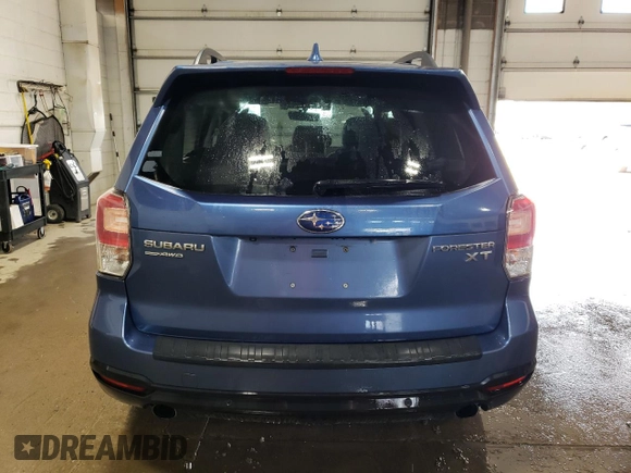 2017 Subaru Forester Touring with VIN JF2SJGWC8HH454995, listed as a Copart auction lot 60930545 with 90,309 mi miles and Salvage title. Bid and sale history available at DreamBid. Image 6.