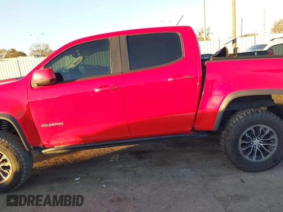 2018 Chevrolet Colorado 4WD ZR2 with VIN 1GCGTEEN7J1155034, listed as a IAAI auction lot 41157795 with 54,005 mi miles. Bid and sale history available at carsss.com. Image 14.