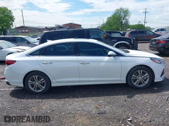 2018 Hyundai Sonata SEL with VIN 5NPE34AF9JH670688, listed as a IAAI auction lot 42115485 with 148,519 mi miles and . Bid and sale history available at carsss.com. Image 13.