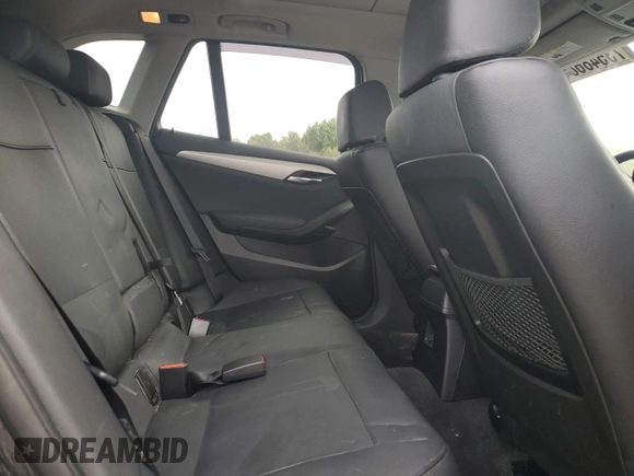 2015 BMW X1 xDrive28i with VIN WBAVL1C58FVY39591, listed as a Copart auction lot 73548684 with 152,569 mi miles and Salvage Title. Bid and sale history available at carsss.com. Image 10.