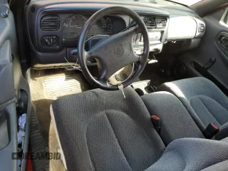 1999 Dodge Dakota SLT with VIN 1B7FL26X0XS233747, listed as a Copart auction lot 78819034 with 231,948 mi miles and Salvage Title. Bid and sale history available at carsss.com. Image 8.