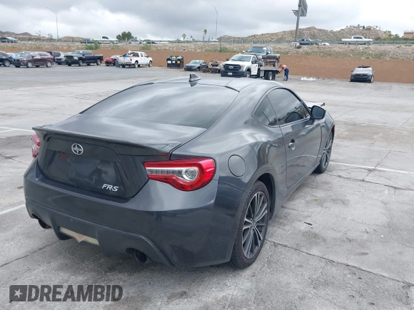 2016 Scion FR-S with VIN JF1ZNAA11G9708176, listed as a IAAI auction lot 41787608 with 82,815 mi miles. Bid and sale history available at carsss.com. Image 4.