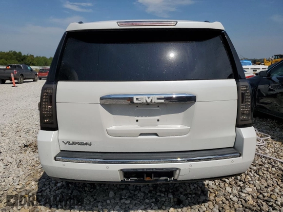 2016 GMC Yukon Denali with VIN 1GKS1CKJ3GR403865, listed as a Copart auction lot 68534264 with 129,655 mi miles and Salvage Title. Bid and sale history available at carsss.com. Image 6.