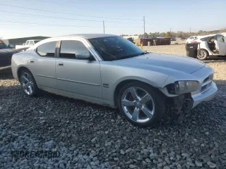 2009 Dodge Charger R/T with VIN 2B3LA53T59H501778, listed as a Copart auction lot 44105905 with 205,512 mi miles and Salvage Title. Bid and sale history available at carsss.com. Image 4.