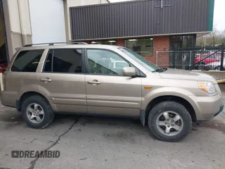 2006 Honda Pilot EX-L with VIN 2HKYF18516H528116, listed as a IAAI auction lot 41782324 with 245,280 mi miles and . Bid and sale history available at DreamBid. Image 13.