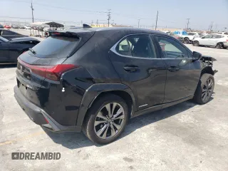 2022 Lexus UX 250h F Sport with VIN JTHE9JBH7N2059948, listed as a Copart auction lot 68671394 with 84,729 mi miles and Salvage Title. Bid and sale history available at DreamBid. Image 3.