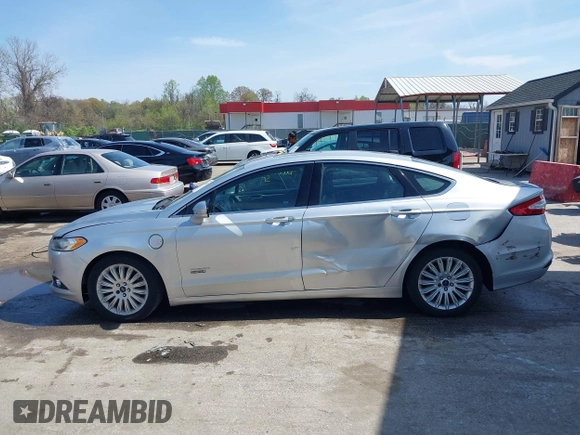 2016 Ford Fusion Energi SE Luxury with VIN 3FA6P0PU8GR273122, listed as a IAAI auction lot 42062083 with 166,318 mi miles. Bid and sale history available at carsss.com. Image 14.