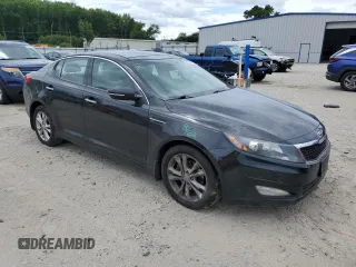 2013 Kia Optima EX z VIN 5XXGN4A70DG118993, wystawiony jako Copart lot #62630125 z przebiegiem 187 103 mil mil oraz Szkoda całkowita • Salvage title. Historia ofert i sprzedaży dostępna na DreamBid. Obrazek 4.