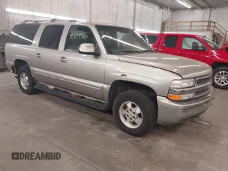 2001 Chevrolet Suburban LS z VIN 3GNFK16T51G179930, wystawiony jako IAAI lot #42425300 z przebiegiem 136 256 mil mil oraz . Historia ofert i sprzedaży dostępna na DreamBid. Obrazek 1.