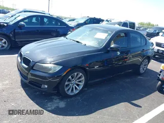 2011 BMW 3 Series 328i with VIN WBAPH7G50BNM56021, listed as a IAAI auction lot 42006563 with 178,919 mi miles. Bid and sale history available at carsss.com. Image 2.