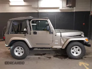 2004 Jeep Wrangler Sahara with VIN 1J4FA59S64P736389, listed as a IAAI auction lot 41432819 with 102,830 mi miles and . Bid and sale history available at DreamBid. Image 13.