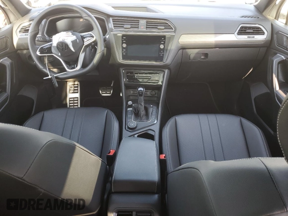 2023 Volkswagen Tiguan SE R-Line Black with VIN 3VV8B7AX8PM138539, listed as a Copart auction lot 56258485 with 11,195 mi miles and Clean Title. Bid and sale history available at DreamBid. Image 8.