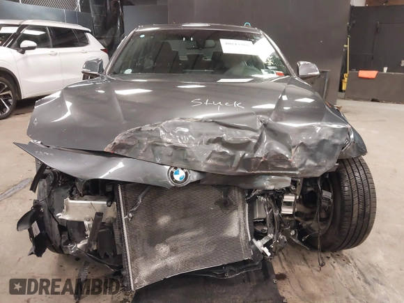 2018 BMW 3 Series 330i xDrive with VIN WBA8D9C58JA608327, listed as a IAAI auction lot 40843366 with 60,773 mi miles and . Bid and sale history available at DreamBid. Image 12.