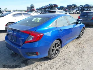 2021 Honda Civic Sedan Sport with VIN 2HGFC2F84MH516374, listed as a IAAI auction lot 41883510 with 43,688 mi miles. Bid and sale history available at carsss.com. Image 4.