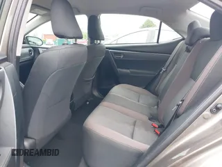 2018 Toyota Corolla L with VIN 2T1BURHE9JC990834, listed as a IAAI auction lot 42583027 with 217,143 mi miles and . Bid and sale history available at DreamBid. Image 8.