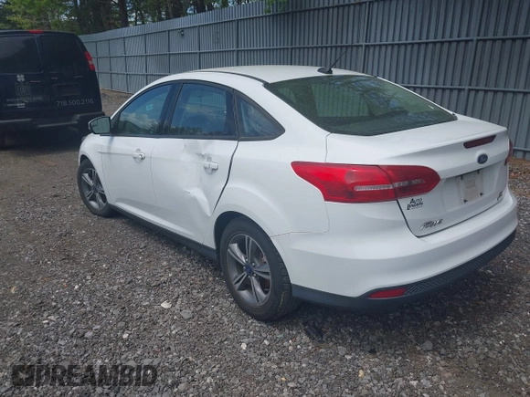 2017 Ford Focus SE with VIN 1FADP3FEXHL233966, listed as a IAAI auction lot 42220832 with 70,197 mi miles and . Bid and sale history available at carsss.com. Image 3.