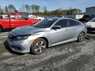 2020 Honda Civic LX z VIN 19XFC2F61LE014672, wystawiony jako Copart lot #51091705 z przebiegiem 104 554 mil mil oraz Szkody całkowita. Historia ofert i sprzedaży dostępna na DreamBid. Obrazek 1.