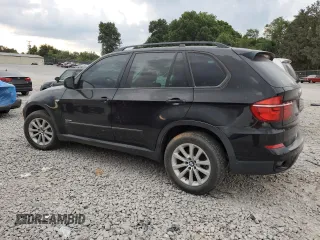 2012 BMW X5 35i with VIN 5UXZV4C59CL763577, listed as a Copart auction lot 62496155 with 148,240 mi miles and Clean title. Bid and sale history available at DreamBid. Image 2.
