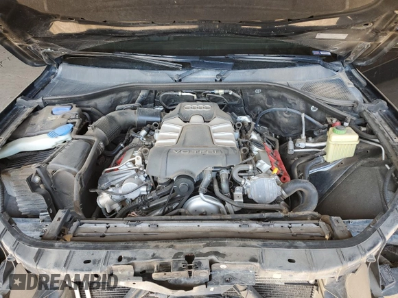 2014 Audi Q7 3.0T Premium with VIN WA1CGAFE1ED017773, listed as a Copart auction lot 49461585 with 121,075 mi miles and Salvage Title. Bid and sale history available at carsss.com. Image 12.
