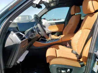 2025 BMW X5 sDrive40i with VIN 5UX13EU04S9Y41593, listed as a Copart auction lot 49856115 with 395 mi miles and Salvage Title. Bid and sale history available at carsss.com. Image 7.
