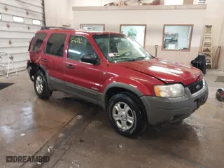 2001 Ford Escape XLT with VIN 1FMYU04101KF46809, listed as a IAAI auction lot 41664202 with 256,468 mi miles. Bid and sale history available at carsss.com. Image 1.