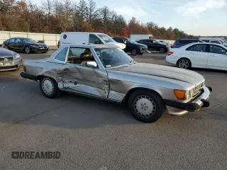 1987 Mercedes-Benz 560 560SL with VIN WDBBA48D9HA070265, listed as a Copart auction lot 77411844 with 120,884 mi miles and Salvage Title. Bid and sale history available at carsss.com. Image 4.