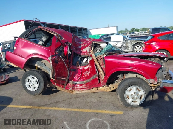 2000 Chevrolet Blazer LS z VIN 1GNDT13W6YK162818, wystawiony jako IAAI lot #42161533 z przebiegiem Nie podano mil oraz . Historia ofert i sprzedaży dostępna na DreamBid. Obrazek 6.